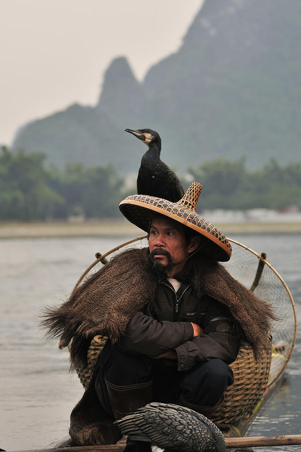 Fisherman and Cormorant on Li River Photograph by Huang Xin