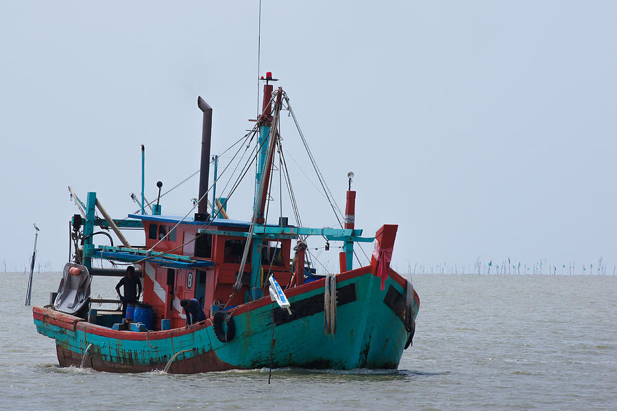 Fisherman boat Photograph by Shaifulzamri