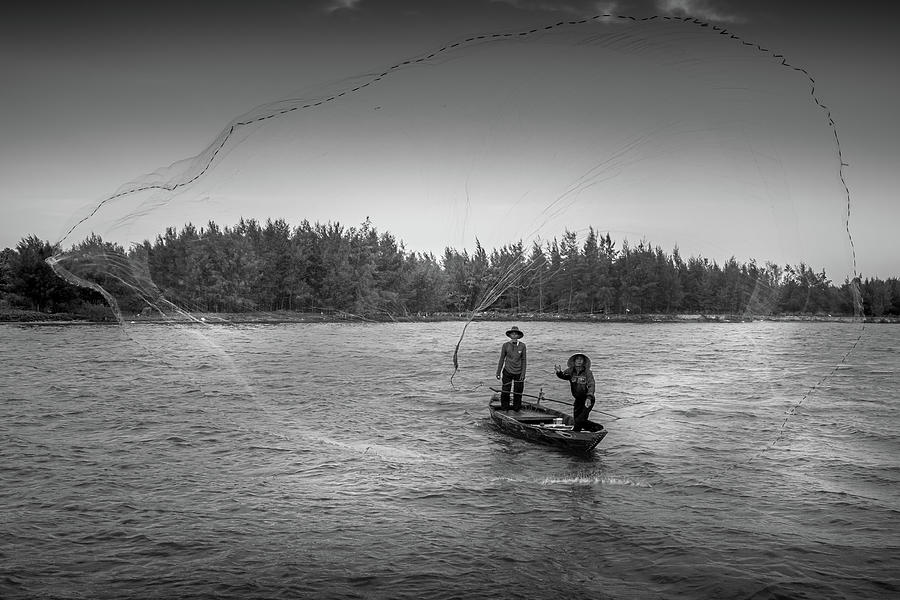 Fishermen Casting Net  Photograph by Arj Munoz