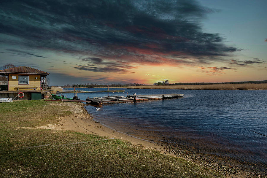 Fishermen House And Pier At Sunset Delta ..Jurmala  Photograph by Aleksandrs Drozdovs