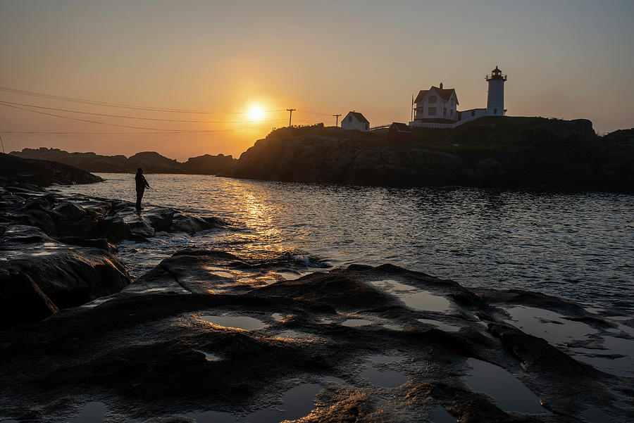 Fishing at the Nubble Lighthouse at Sunrise Cape Neddick York Maine ME Photograph by Toby McGuire