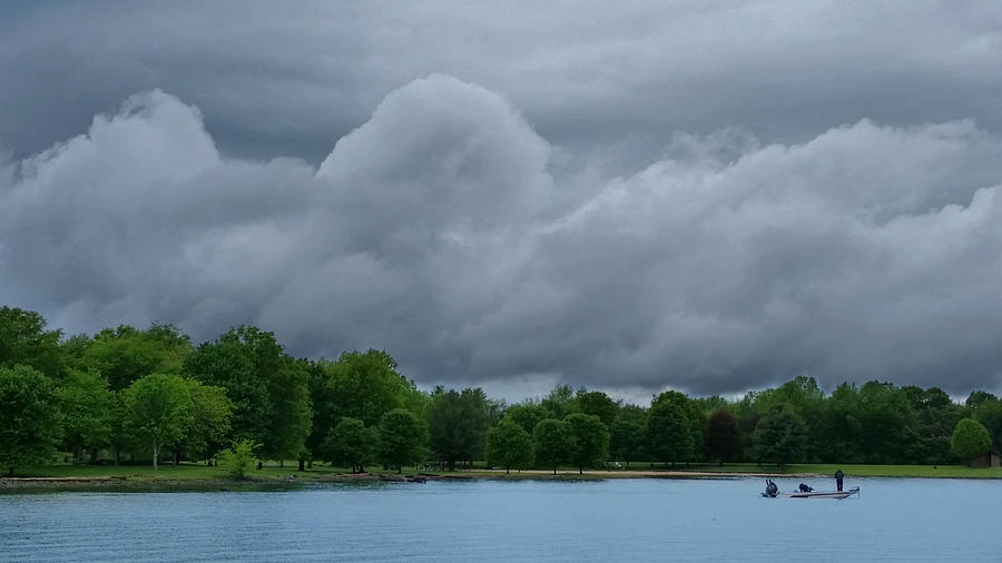 Fishing Before the Storm Photograph by Ally White