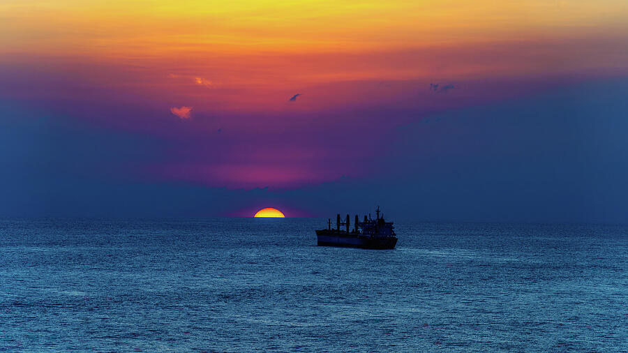 Sunset Photograph - Fishing Boat at Sunset by Laura Epstein