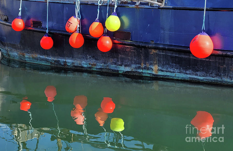 Fishing Boat Bumpers Sunlit Photograph by Norma Appleton