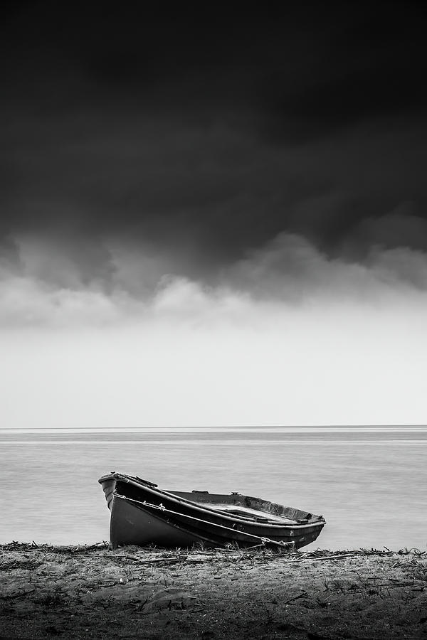 Fishing Boat on the Shore in Black and White Photograph by Alexios Ntounas