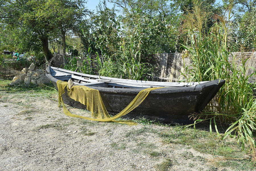 Fishing boats and nets Photograph by Leonid Eremeychuk
