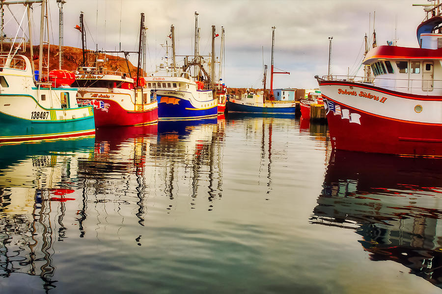 Fishing boats water reflections Newfoundland Photograph by Tatiana Travelways