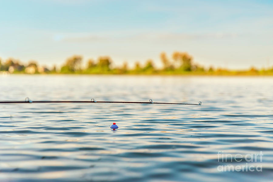 Fishing Bobber Floats In Water Photograph