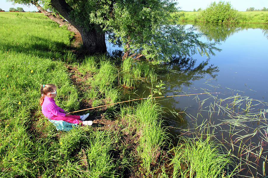 Fishing Littlle Girl On Pond Photograph by Mikhail Kokhanchikov