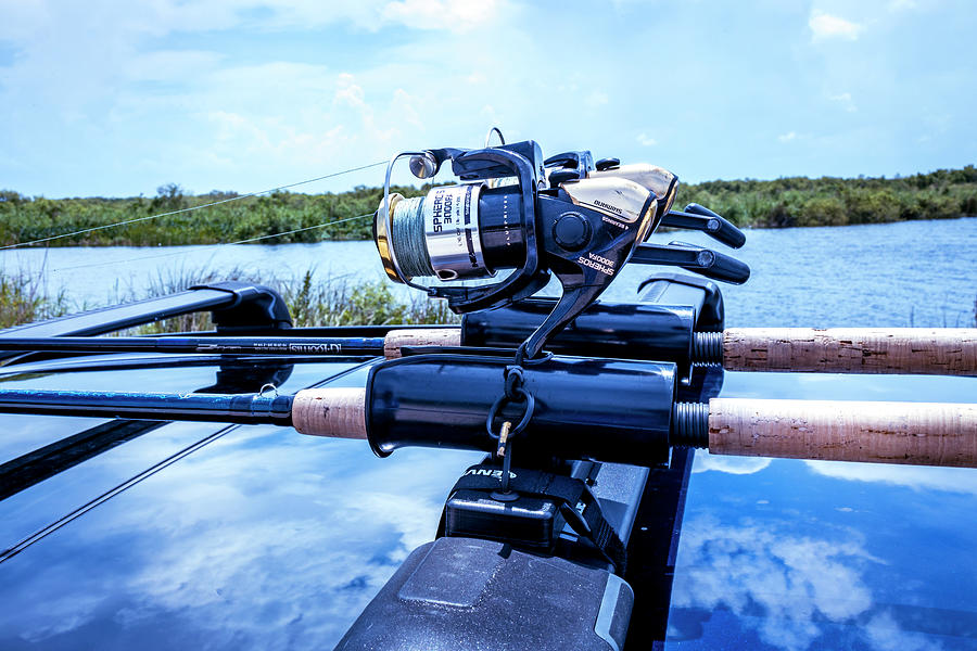 Fishing Rods and Reels Racked Photograph by Blair Damson