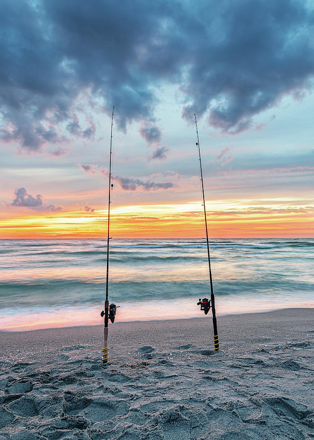 Fishing rods at Sunset Photograph by Rudy Wilms