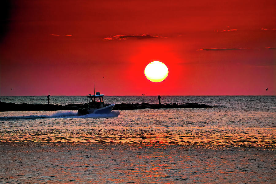 Fishing with the Sun at Indian River Photograph by Bill Swartwout