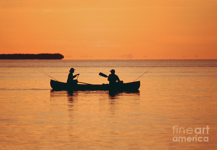 Fishermen on a Canoe in Florida Bay, Everglades National Park Photograph by Wernher Krutein