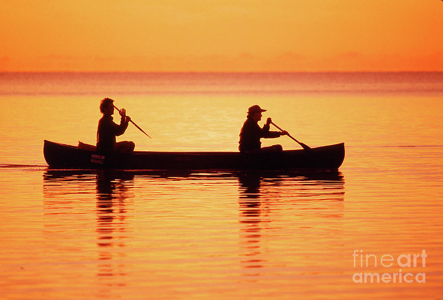 Fishermen Paddeling a Canoe, Everglades National Park #2 Photograph by Wernher Krutein