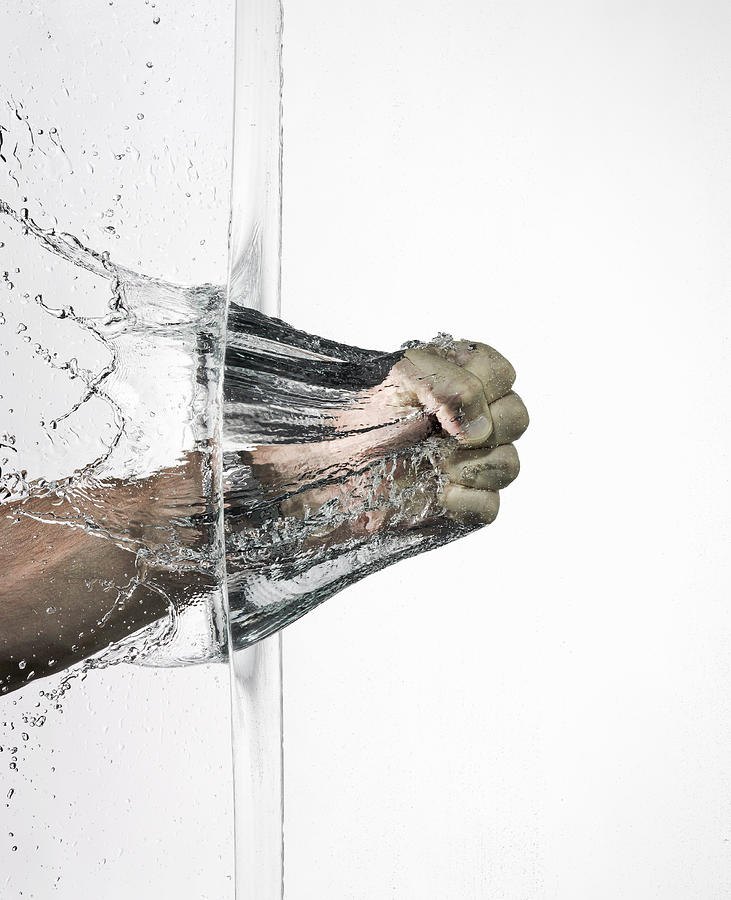 Fist braking a water wall Photograph by Buena Vista Images