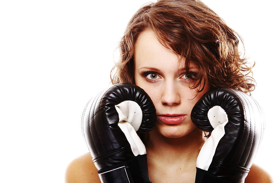 Fit woman boxing - isolated over white Photograph by Voyagerix