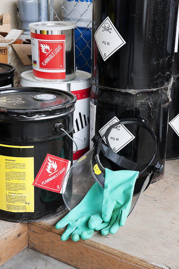 Five piled buckets containing flammable liquids Photograph by SteveDF