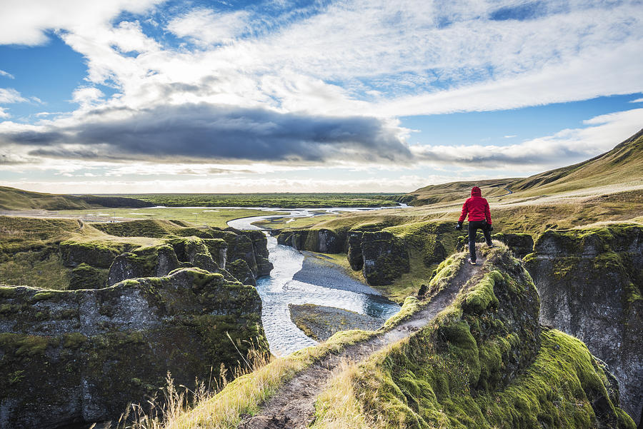 Fjadrargljufur, Iceland, Europe. A man admires the panorama Photograph by Andrea Comi
