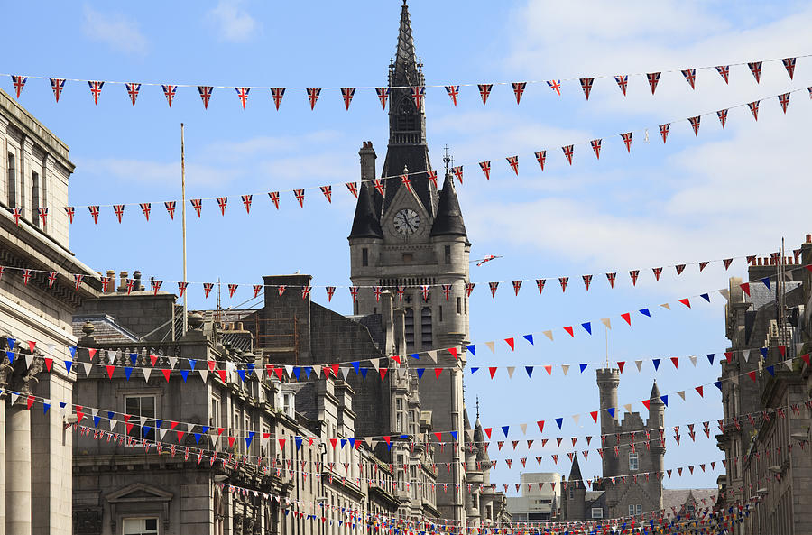 Flags hung on Union Street in Aberdeen  Photograph by Gannet77