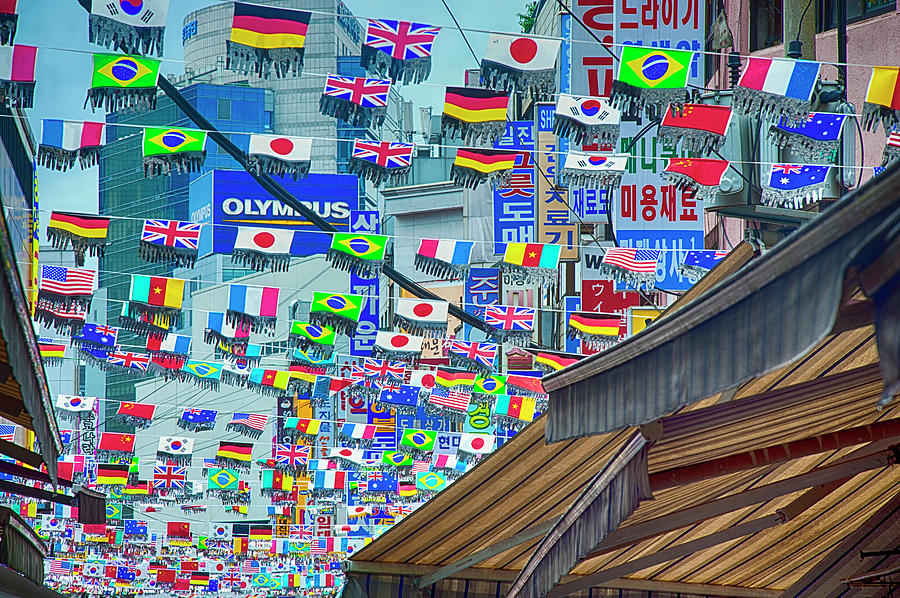 Flags in the Korean Marketplace Photograph by Anthony M Davis