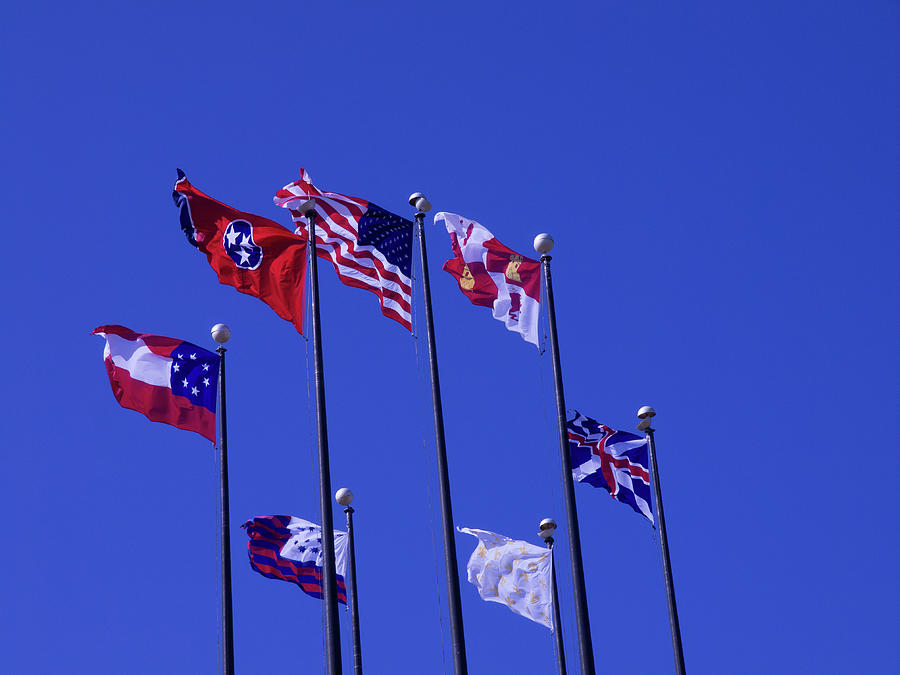 Flags In The Wind Photograph by David Desautel