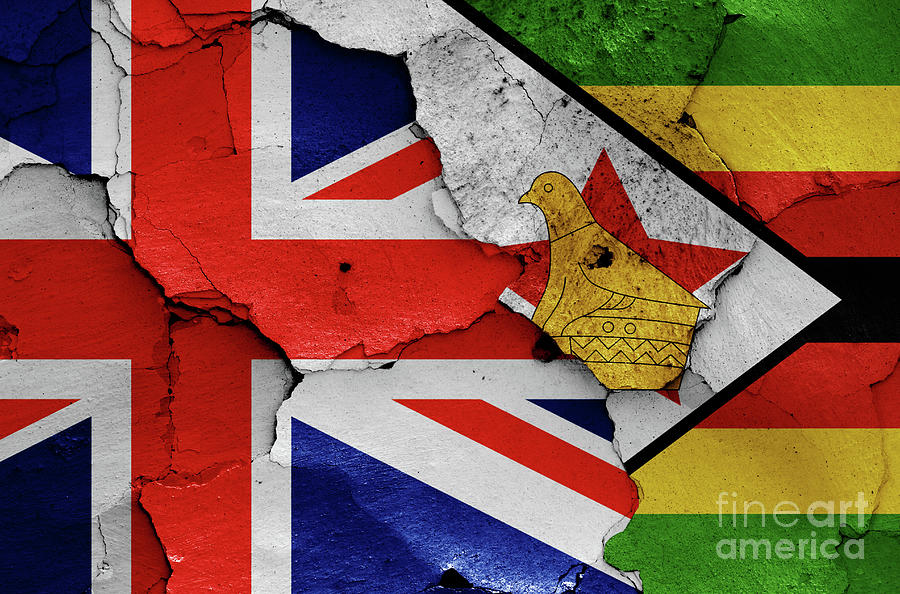 flags of UK and Zimbabwe painted on cracked wall Photograph by Dan Radi ...