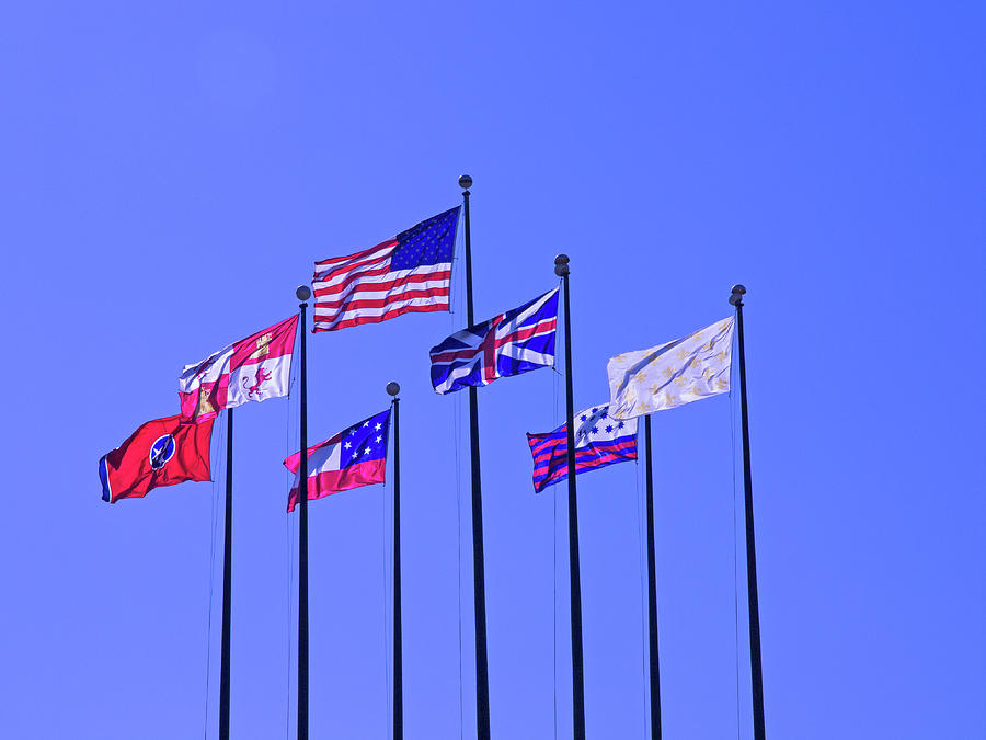 Flags On A Blue Sky Photograph by David Desautel