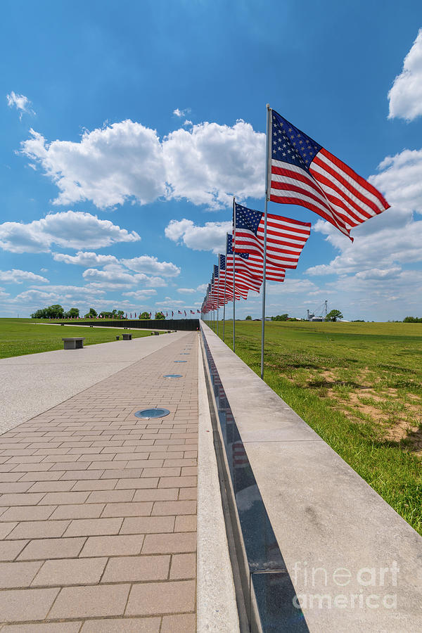 Flags over MO Veterans Memorial Vietnam Wall Photograph by Jennifer White