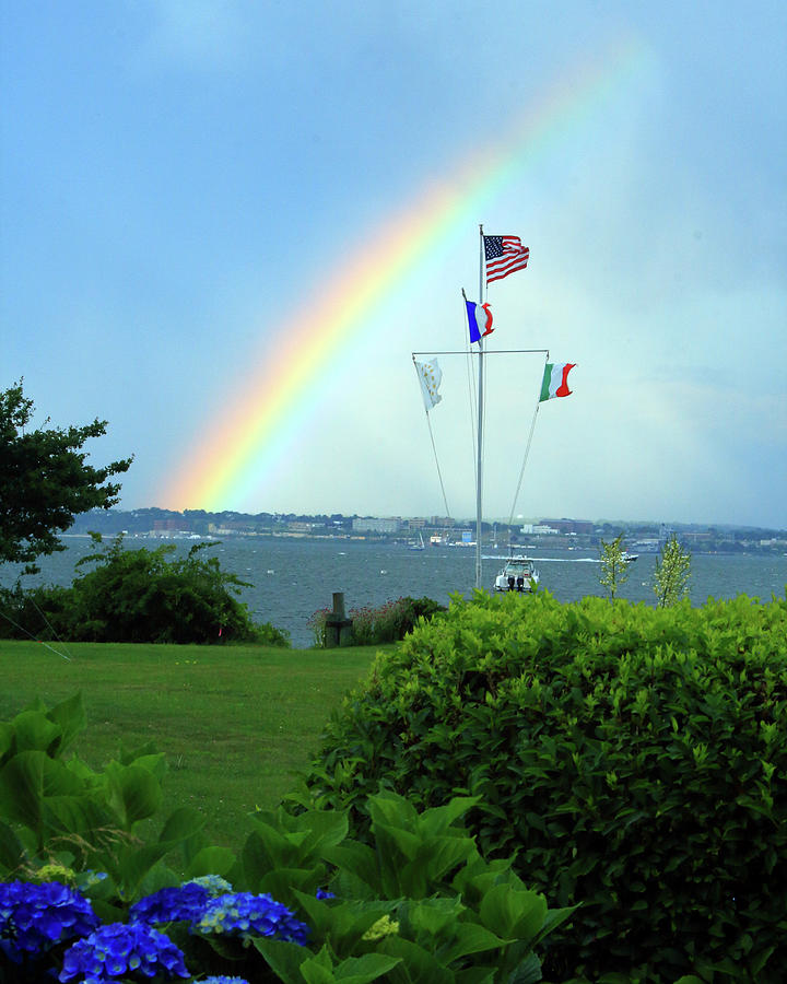 Flags with a rainbow Photograph by Jim Feldman