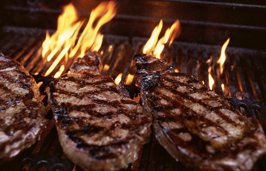 Flame Grilled Steak Photograph by Carlos Davila