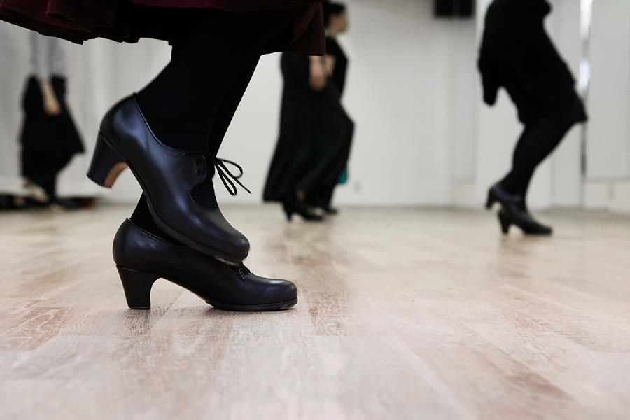 Flamenco dancer kicking the floor Photograph by Taiyou Nomachi