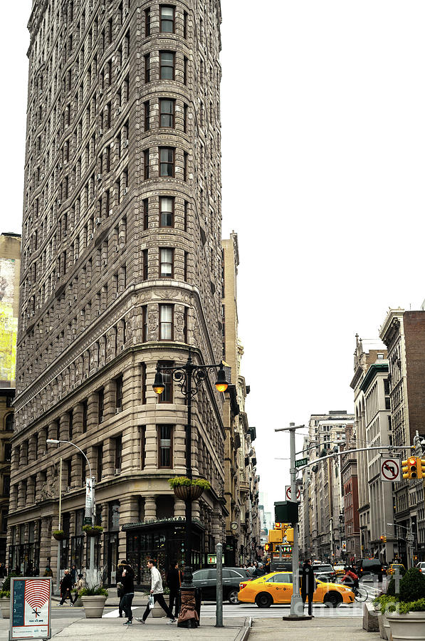 Flatiron Walking in New York City Photograph by John Rizzuto