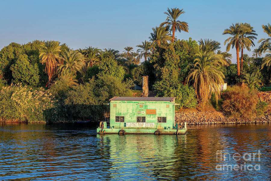 Floating pump station on the Nile river, Egypt Photograph by Delphimages Photo Creations