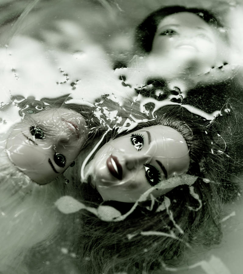  Floating Doll Heads 2 Photograph by Kevin Duke
