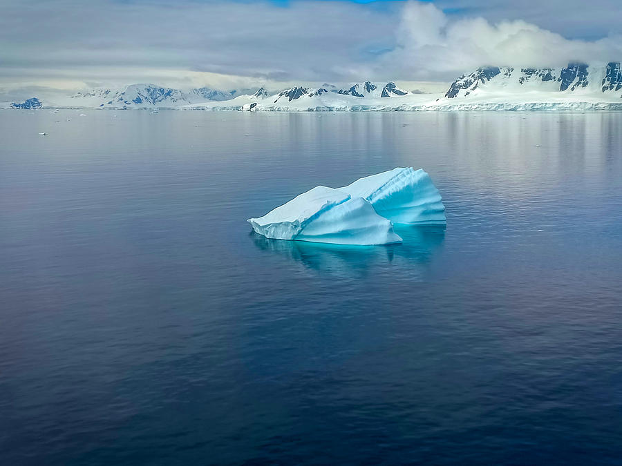 Floating Iceberg In North Pole And Frozen Mountains Photograph by Anish ...