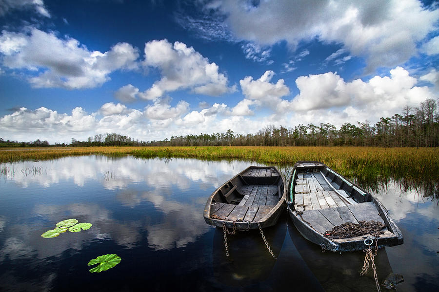 Boat Photograph - Floating on the Clouds in Blue by Debra and Dave Vanderlaan