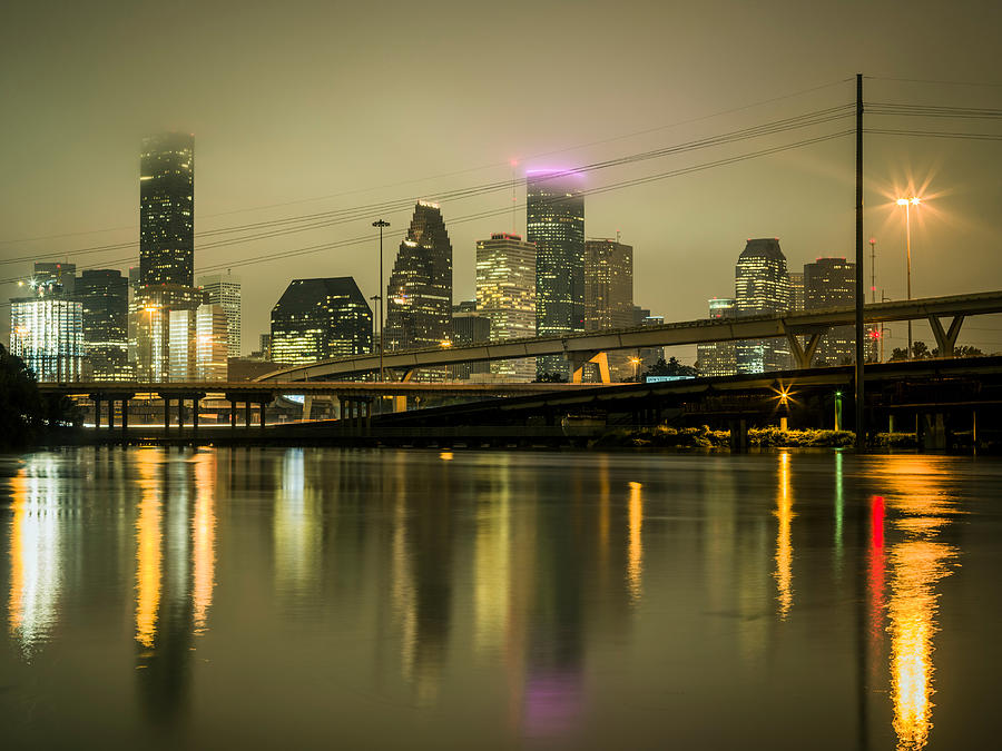 Flooding in downtown Houston, at night Photograph by Chinaface