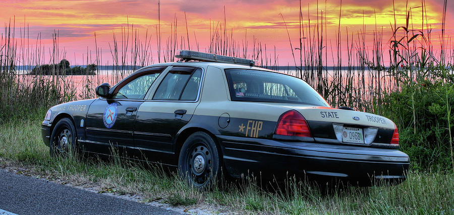 Sunset Photograph - Florida Highway Patrol by JC Findley
