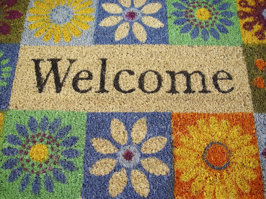 Flower decorated doormat with welcome sign Photograph by FrankvandenBergh