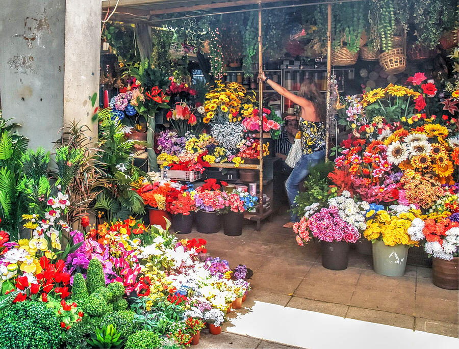 flower stall in the Bolhao Market in the city of Oporto. Portugal Photograph by Japatino