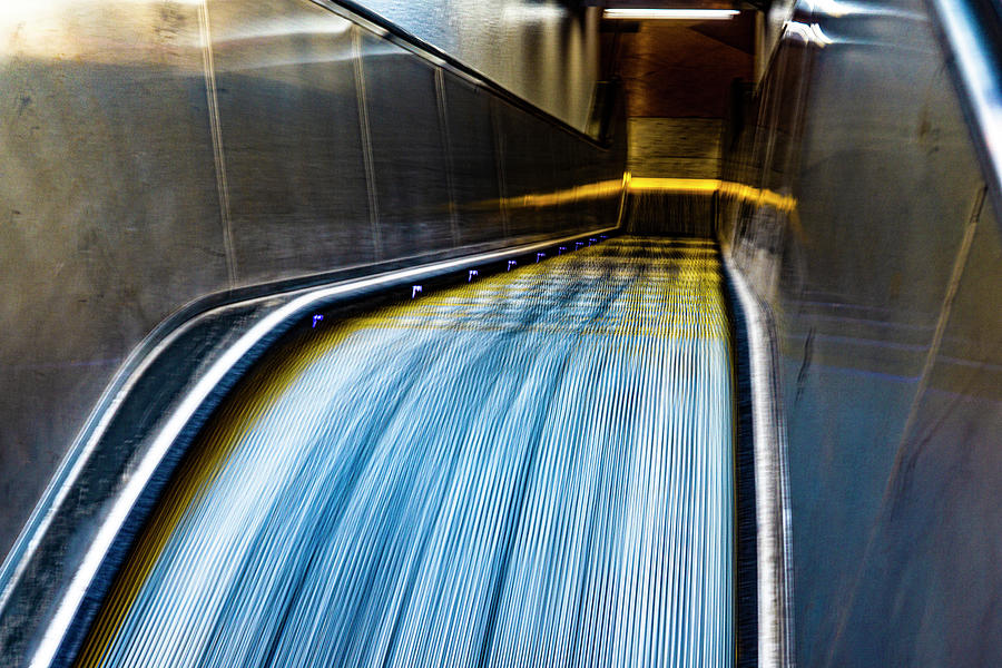 Flowing Subway Escalator Photograph by David Morehead