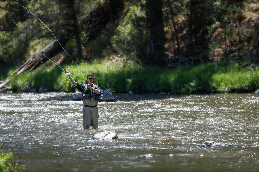 Fly fishing in the Crooked River Photograph by Murray Rudd