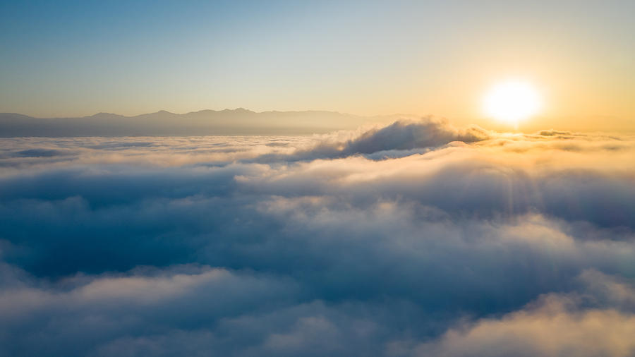 Flying above the clouds Photograph by Matt Dutcher