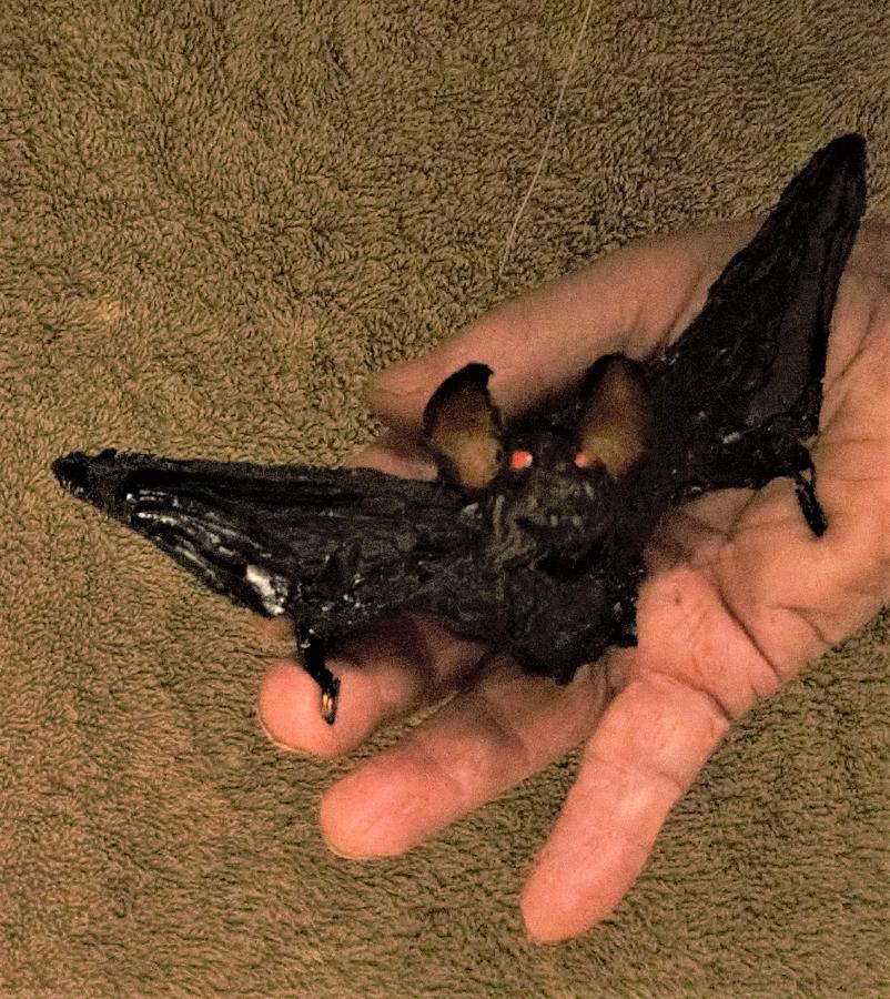 Flying Bat in Hand Sculpture by Roger Swezey
