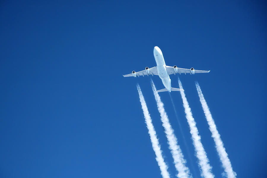 flying high. Commercial jet at altitude Photograph by Lsannes