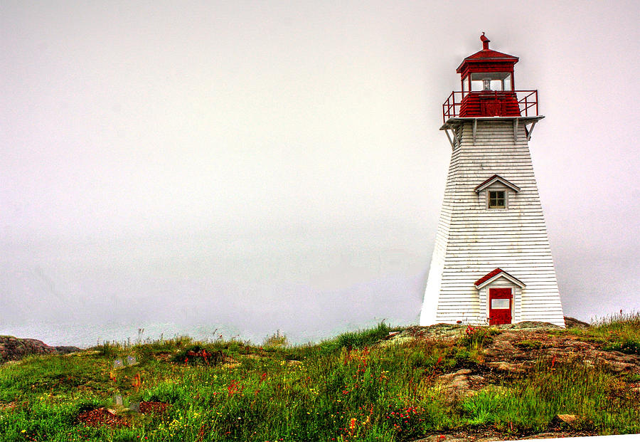 Fog Lighthouse  Photograph by David Matthews