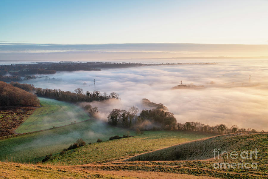 Fog over Devizes from Roundway Hill in the Evening Light Photograph by Tim Gainey