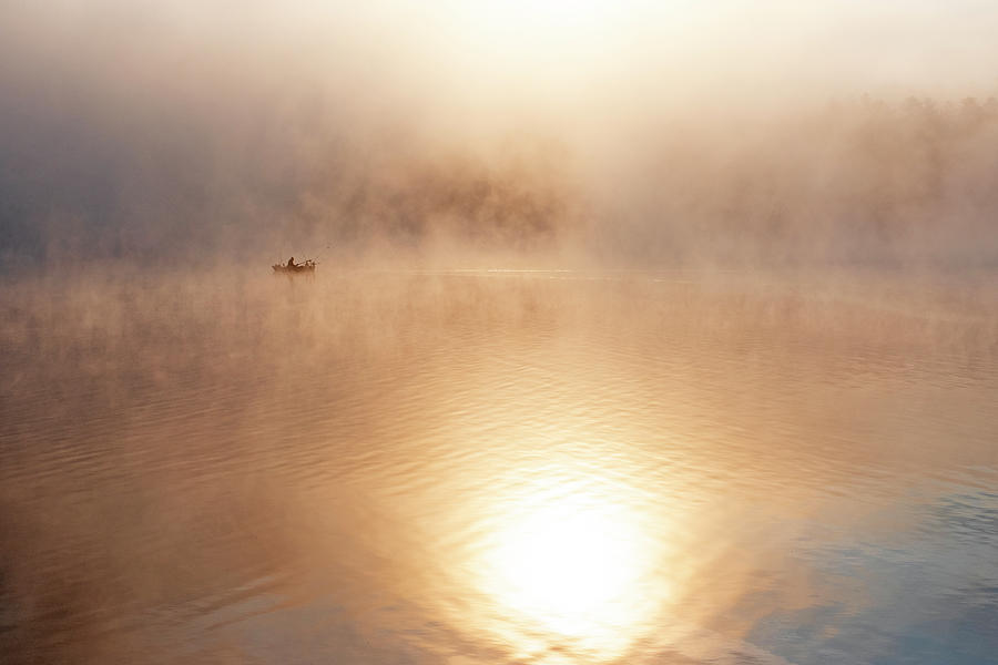 Foggy Fishing Boat on Walden Pond Concord Massachusetts as Sunrise Photograph by Toby McGuire