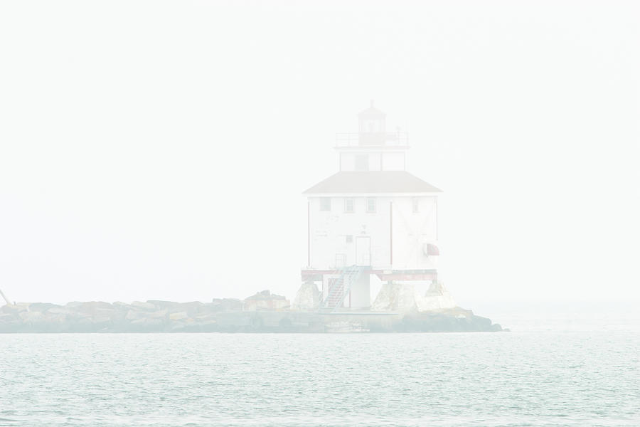 Foggy Lighthouse Photograph by Jan Luit