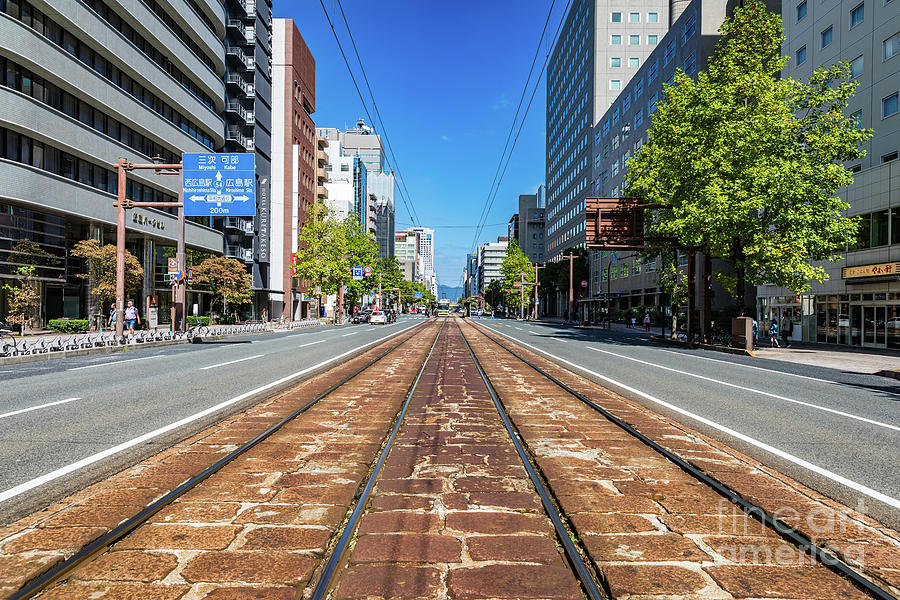 Follow the tracks - Hiroshima tramway Photograph by Lyl Dil Creations